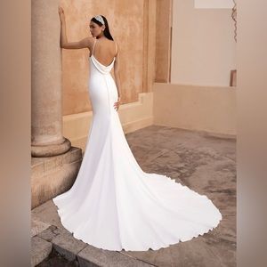 Brand new, never worn Pronovias Antiope wedding gown. Tags intact.